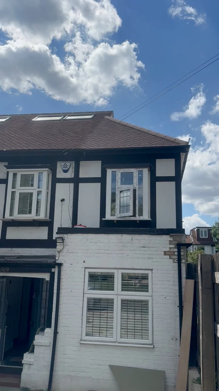 New first-floor extension with timbered detailing and pitched roof by Alb Homes in Hampstead