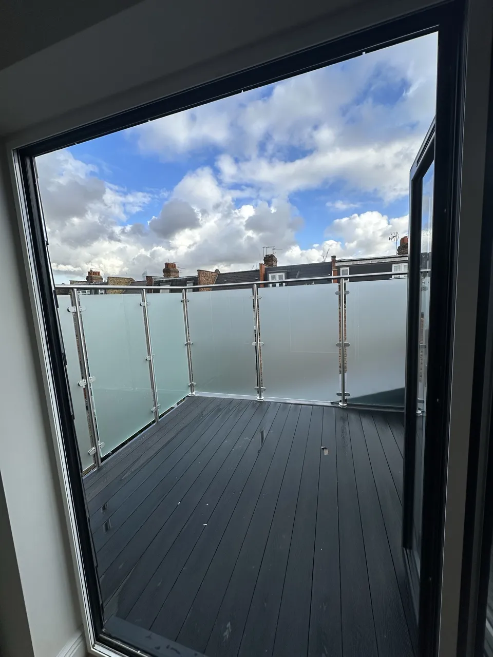 Roof terrace off the loft: Flat Conversion with New Loft in White City by Alb Homes